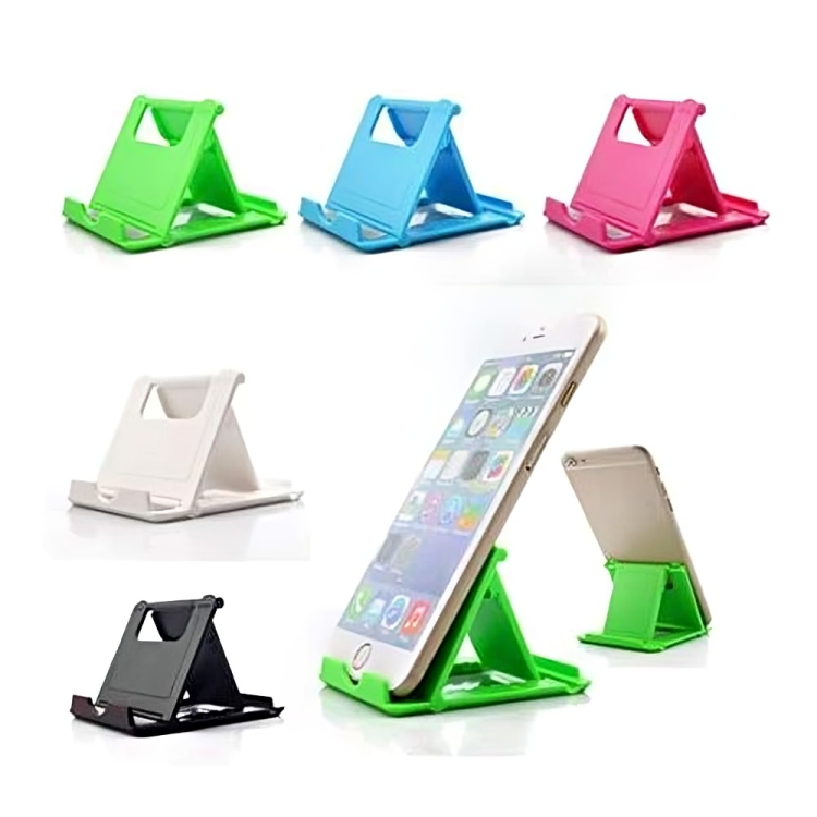 Portable, foldable desktop mobile phone holder, compatible with all devices.  Pink